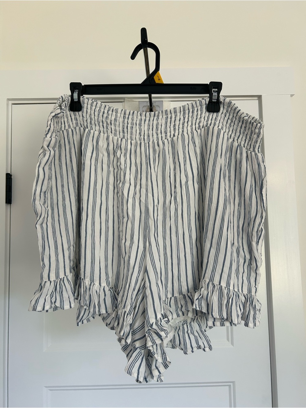 Black Tape_ White Shorts with Navy Vertical Stripes and Ruffle Hem